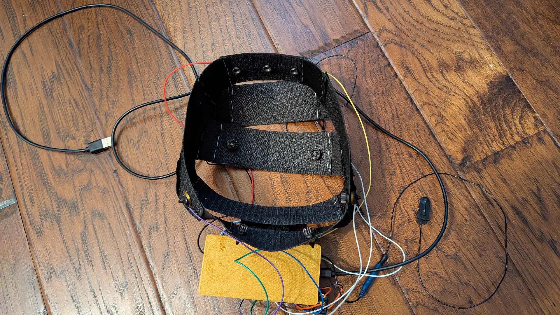 Interior view of the CereBRAH Soft-EEG headband showing electrode sandwich assembly and wiring